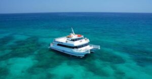 Key West: Glass Bottom Boat Reef Tour with Sunset Option - Cruising by Key West Before the Reef Viewing Starts