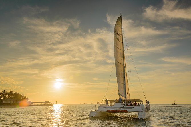 Key West Sunset Sail: Dolphin Watching, Wine, and Tapas - Sunset Time: The Sweet Spot and Why Clouds Matter