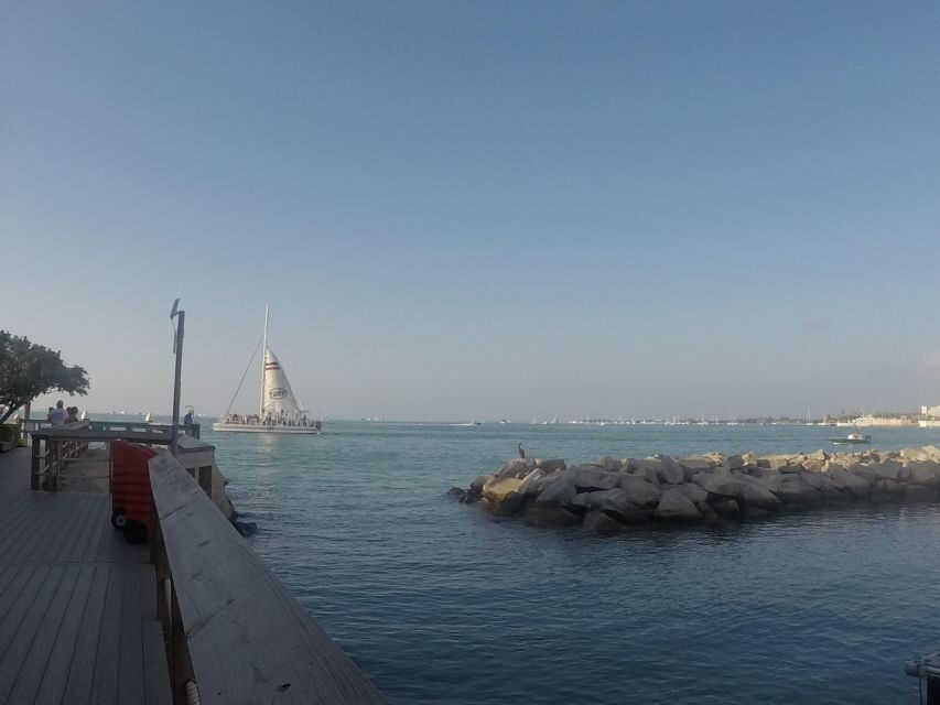 Key West Tour and Coral Reef Snorkeling with Open Bar - Key West Time: Free Walking, Landmarks, and the Clock at 5:30 p.m.